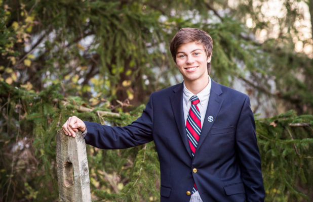 portrait of young man wearing suit